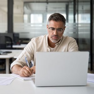 man working hard on computer