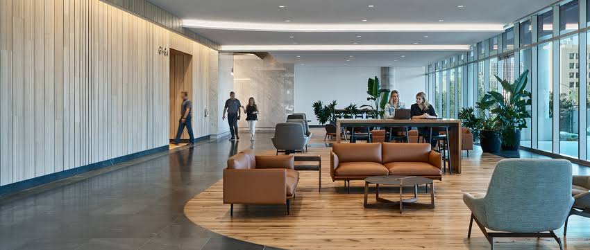 Clean, modern commercial office lobby with comfortable seating